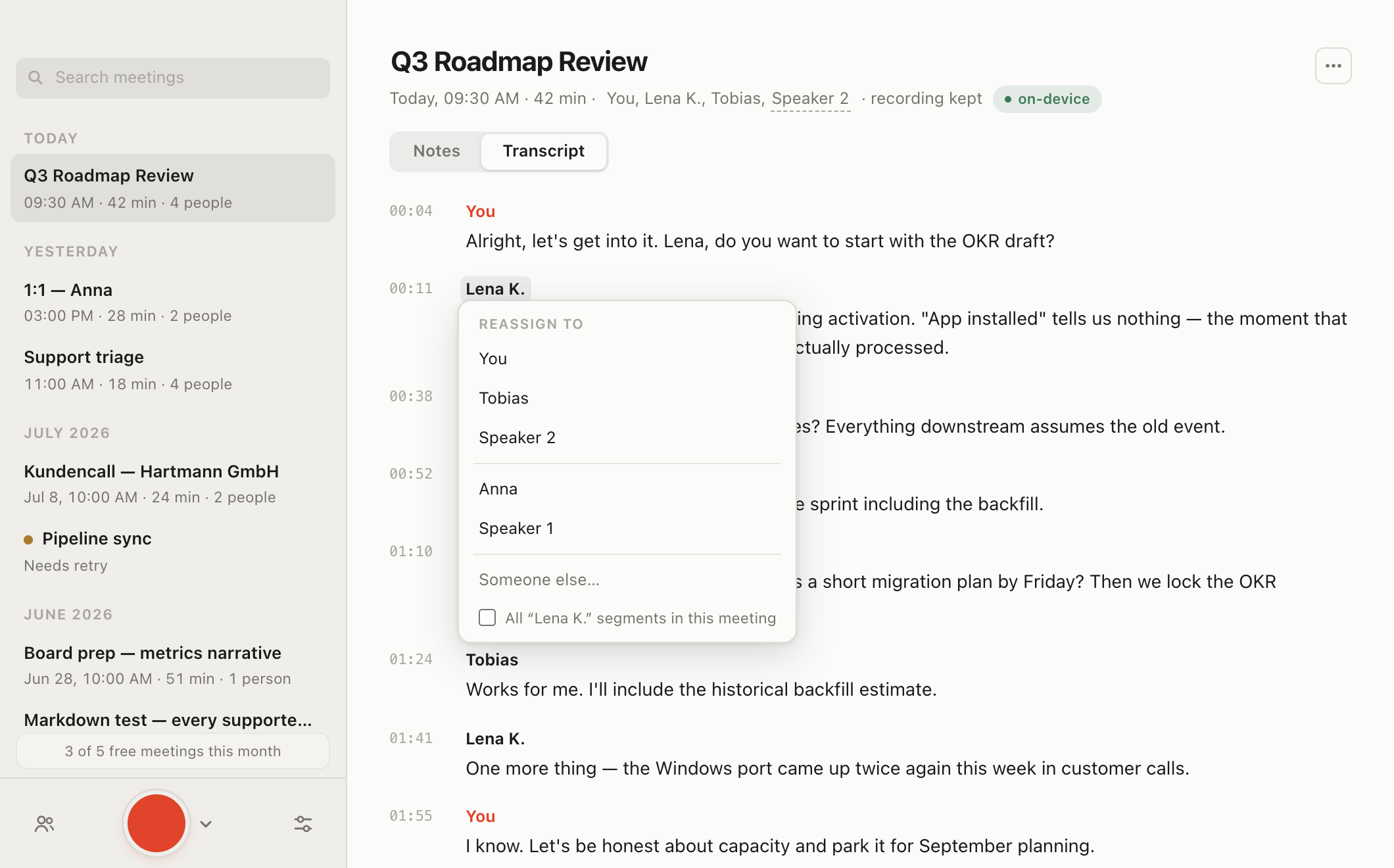 The transcript with a segment's reassign popover open, listing this meeting's participants, other profiles, and a free-text option.